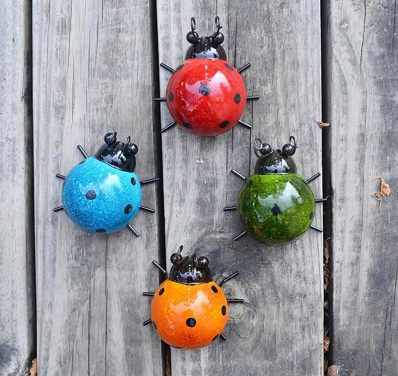 GIFTME 5 Metal Garden Wall Art Decorative Set of 4 Cute Ladybugs Outdoor Wall Sculptures https://www.amazon.com/dp/B07HF2Z653