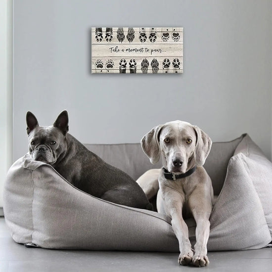 ARTINME Dog Lover Sign Wall Decor,Take A Moment to Paws sign Pet Paw Print Artwork Footprints Canvas Wall Art,Framed Animal prints Puppy Gifts for Front Door home decoration (Black) https://www.amazon.com/dp/B09FLQ57SP